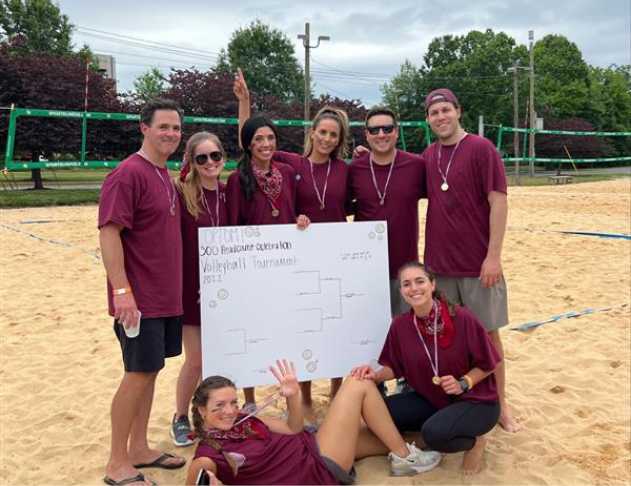 Optomi Professional Services When In Charlotte North Carolina VBGB Beer Hall and Garden Restaurant Milestone Volleyball Tournament Celebration maroon team