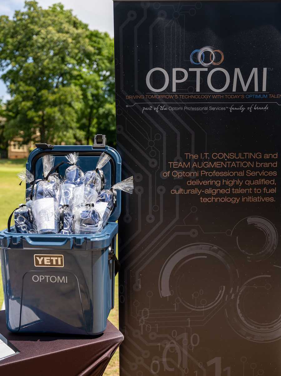 Optomi Charlotte Community Involvement SIM Golf Event YETI Swag